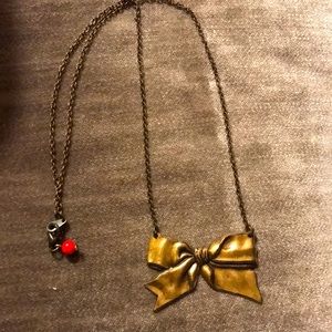 Beautiful Brass Toned Bow Necklace